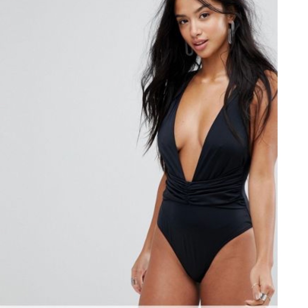 NWOT Black petite plunge one-piece swimsuit.